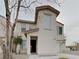 Inviting two-story home with a charming front entrance and desert landscaping at 2132 Tierra Del Verde St, Las Vegas, NV 89156