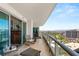 Outdoor patio furniture on balcony with stunning panoramic views of city and golf course at 222 Karen Ave # 3305, Las Vegas, NV 89109