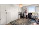 Bright bedroom featuring custom built-ins, desk area, and a large window with a city view at 222 Karen Ave # 3305, Las Vegas, NV 89109