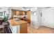 Well-equipped kitchen featuring a large island with seating, stylish cabinets, and modern appliances at 222 Karen Ave # 3305, Las Vegas, NV 89109