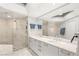 Elegant bathroom featuring double sinks, a walk-in shower, and luxury tile at 222 Karen Ave # 3305, Las Vegas, NV 89109
