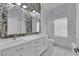 Stylish bathroom features double sink vanity with white marble and tiled backsplash at 2305 W Horizon Ridge Pkwy # 611, Henderson, NV 89052