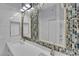 Close-up of modern bathroom vanity with mosaic tile backsplash at 2305 W Horizon Ridge Pkwy # 611, Henderson, NV 89052