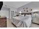 Bedroom with wooden accents, plush bedding and light-colored flooring at 2305 W Horizon Ridge Pkwy # 611, Henderson, NV 89052