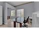 Home office with natural light, a glass-top desk, and neutral decor at 2305 W Horizon Ridge Pkwy # 611, Henderson, NV 89052