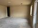 Spacious living room with bare walls at 2451 E Falcon St, Pahrump, NV 89048