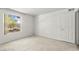 Bright bedroom with a large window letting in natural light at 2606 S Durango Dr # 276, Las Vegas, NV 89117