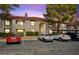 Exterior of the home featuring mature landscaping and convenient parking at 2606 S Durango Dr # 276, Las Vegas, NV 89117