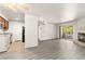Open-concept living space with fireplace, kitchen, and outdoor balcony at 2606 S Durango Dr # 276, Las Vegas, NV 89117