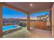 Inviting backyard area with tub and patio, perfect for relaxation and outdoor enjoyment at 2787 Donatello Manor Pl, Henderson, NV 89044