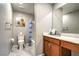 Well-maintained bathroom features a single vanity, tub-shower combo, and updated fixtures at 2787 Donatello Manor Pl, Henderson, NV 89044