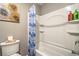 Bathroom featuring a shower and tub combo, blue curtain, and neutral wall paint at 2787 Donatello Manor Pl, Henderson, NV 89044