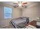 Bedroom featuring a full sized bed, desk, and window at 2787 Donatello Manor Pl, Henderson, NV 89044
