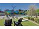 Well-appointed poolside area with comfortable seating and modern architecture, perfect for community gatherings at 2787 Donatello Manor Pl, Henderson, NV 89044