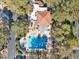 Aerial view of community pool and amenities surrounded by trees, showcasing a relaxing and private setting at 2851 S Valley View Blvd # 1120, Las Vegas, NV 89102