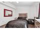 Bright bedroom with a neutral color scheme, laminate floors, and a ceiling fan at 2851 S Valley View Blvd # 1120, Las Vegas, NV 89102