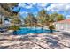 Large community pool with lounge chairs and umbrellas providing a resort-like atmosphere for residents at 2851 S Valley View Blvd # 1120, Las Vegas, NV 89102