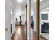 Hallway with wood floors leads to a bathroom and bedroom at 2851 S Valley View Blvd # 1120, Las Vegas, NV 89102