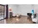 Bright living room featuring hardwood flooring, TV and view to the outside at 2851 S Valley View Blvd # 1120, Las Vegas, NV 89102
