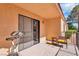 Cozy covered patio with small sitting area and access to the house at 2851 S Valley View Blvd # 1120, Las Vegas, NV 89102