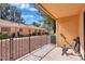 Relaxing patio with wrought iron railing offers views of the meticulously maintained yard and neighboring homes at 2851 S Valley View Blvd # 1120, Las Vegas, NV 89102