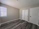 Bedroom featuring closet with sliding doors and a large window at 3238 Canyon Terrace Dr, Laughlin, NV 89029