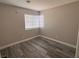 An empty bedroom with a large window allowing ample natural light at 3238 Canyon Terrace Dr, Laughlin, NV 89029