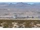 Distant view of the Vegas strip from the desert brush at 3238 Canyon Terrace Dr, Laughlin, NV 89029