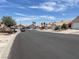 Neighborhood street with sidewalks and street parking at 3238 Canyon Terrace Dr, Laughlin, NV 89029