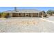 Expansive backyard features a covered patio and ample space for outdoor activities at 3241 E Winery Rd, Pahrump, NV 89048