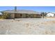 Spacious backyard features a concrete patio ideal for outdoor activities and entertainment at 3241 E Winery Rd, Pahrump, NV 89048