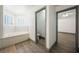 Bathroom showcasing a soaking tub and multiple doorways to adjoining rooms at 3241 E Winery Rd, Pahrump, NV 89048