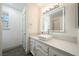 Contemporary bathroom with sleek vanity, vessel sink, large mirror, and modern lighting at 3241 E Winery Rd, Pahrump, NV 89048