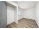 Bright bedroom features light wood floors, a window, and closet space at 3241 E Winery Rd, Pahrump, NV 89048