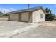 Detached two-car garage with neutral paint and matching roof at 3241 E Winery Rd, Pahrump, NV 89048