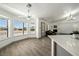 Open living space boasts plenty of natural light and view of the fireplace at 3241 E Winery Rd, Pahrump, NV 89048
