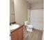 Bathroom with a shower-tub combo, and a single sink vanity, offering essential amenities at 3617 Austell St, Las Vegas, NV 89129
