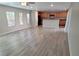 Spacious living room featuring hardwood floors and large windows providing ample natural light at 3617 Austell St, Las Vegas, NV 89129