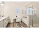 Bright bathroom features a double sink vanity, separate shower, and soaking tub for a luxurious feel at 391 Capistrano Vistas St, Las Vegas, NV 89138