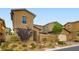 Charming two-story home with well-manicured landscaping and inviting curb appeal at 391 Capistrano Vistas St, Las Vegas, NV 89138