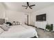 Bright primary bedroom with a king bed, drawers, and neutral decor at 391 Capistrano Vistas St, Las Vegas, NV 89138