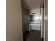 Bathroom features a white vanity with marble countertop and framed mirror at 3930 University Center Dr # 901, Las Vegas, NV 89119
