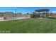 Manicured lawn with barbeque grill and covered picnic area at 3930 University Center Dr # 901, Las Vegas, NV 89119