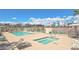 Community pool, hot tub and lounging area with gazebos under a clear sky at 3930 University Center Dr # 901, Las Vegas, NV 89119