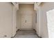 Inviting entryway features double doors and a covered porch, offering a warm welcome to the home at 4029 Ricebird Way, North Las Vegas, NV 89084
