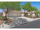 Charming single-story home with a tile roof, mature trees, and a spacious three-car garage at 4029 Ricebird Way, North Las Vegas, NV 89084