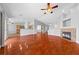 Bright living area features hardwood floors, fireplace, and access to the backyard through sliding glass doors at 4029 Ricebird Way, North Las Vegas, NV 89084