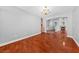 Living room features hardwood floors, light gray walls, and a fireplace at 4029 Ricebird Way, North Las Vegas, NV 89084