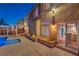 Backyard view featuring a pool, covered patio, and access to the home's interior at 4045 Abernethy Forest Pl, Las Vegas, NV 89141
