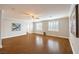 Bright bedroom features wood floors, plantation shutters and recessed lighting at 4045 Abernethy Forest Pl, Las Vegas, NV 89141